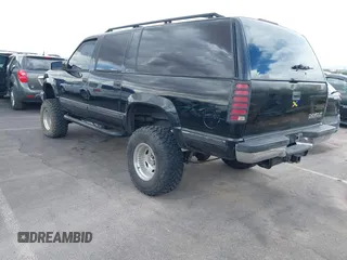 1999 Chevrolet Suburban with VIN 3GNFK16R6XG252736, listed as a IAAI auction lot 41897003 with 140,081 mi miles. Bid and sale history available at carsss.com. Image 3.