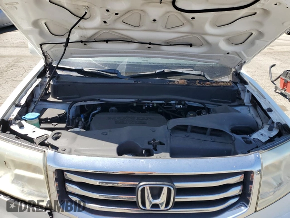 2013 Honda Pilot Touring with VIN 5FNYF4H95DB016049, listed as a Copart auction lot 61012725 with 104,252 mi miles and Salvage title. Bid and sale history available at DreamBid. Image 12.