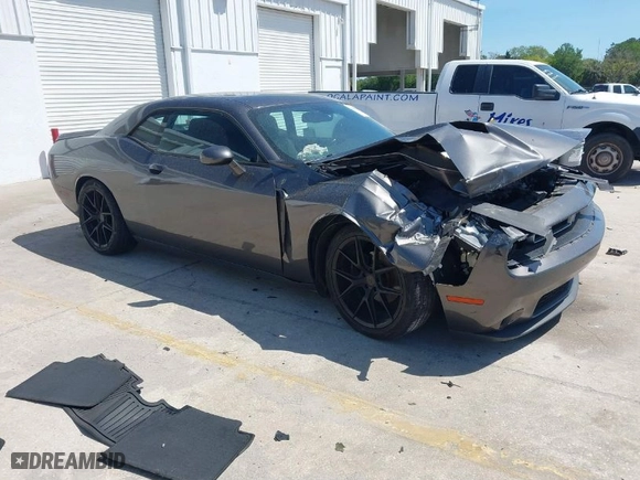 2015 Dodge Challenger SXT with VIN 2C3CDZAG1FH868874, listed as a IAAI auction lot 41883698 with 134,710 mi miles. Bid and sale history available at carsss.com. Image 1.