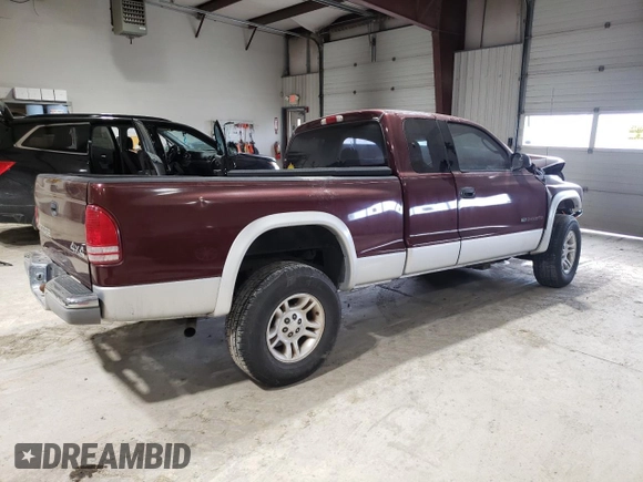 2001 Dodge Dakota Sport z VIN 1B7GG22NX1S172265, wystawiony jako Copart lot #42190165 z przebiegiem 109 799 mil mil oraz Szkoda całkowita • Salvage title. Historia ofert i sprzedaży dostępna na DreamBid. Obrazek 3.