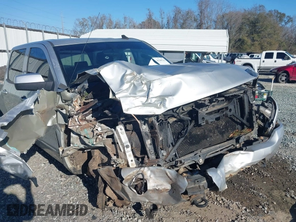 2016 Chevrolet Silverado 1500 LT with VIN 3GCUKREC0GG131034, listed as a IAAI auction lot 41289762 with 176,978 mi miles and . Bid and sale history available at DreamBid. Image 6.