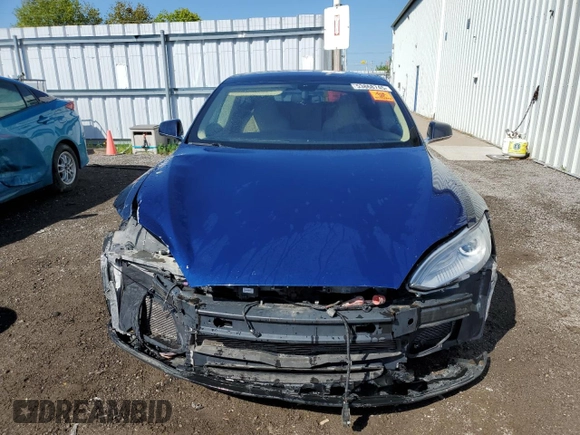 2014 Tesla Model S 60 z VIN 5YJSA1H10EFP35319, wystawiony jako Copart lot #53868745 z przebiegiem 209 424 mil mil oraz Szkoda całkowita • Salvage title. Historia ofert i sprzedaży dostępna na DreamBid. Obrazek 5.