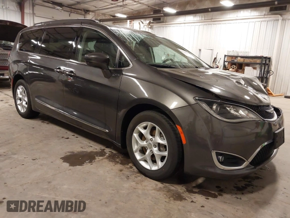 2017 Chrysler Pacifica Touring L with VIN 2C4RC1BG5HR803306, listed as a IAAI auction lot 41968455 with 84,714 mi miles and . Bid and sale history available at DreamBid. Image 1.