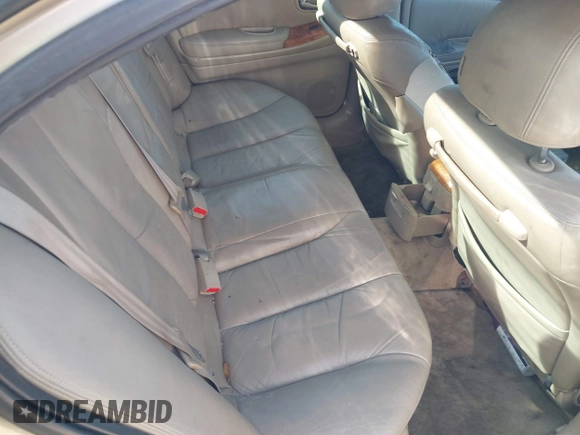2004 Infiniti I35 with VIN JNKDA31A74T212730, listed as a IAAI auction lot 41875508 with 183,741 mi miles. Bid and sale history available at carsss.com. Image 8.