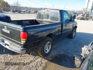 1998 Mazda B-Series 2WD Truck SX with VIN 4F4YR12C8WTM35238, listed as a IAAI auction lot 40652380 with 185,542 mi miles. Bid and sale history available at carsss.com. Image 4.