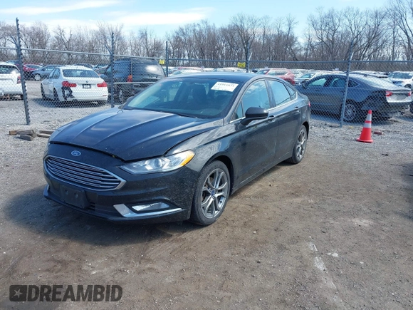 2017 Ford Fusion S with VIN 3FA6P0G71HR347881, listed as a IAAI auction lot 41911834 with 173,508 mi miles. Bid and sale history available at carsss.com. Image 2.