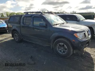 2018 Nissan Frontier Pro-4X with VIN 1N6DD0EV5JN702214, listed as a Copart auction lot 52802715 with 79,837 mi miles and Salvage title. Bid and sale history available at DreamBid. Image 4.
