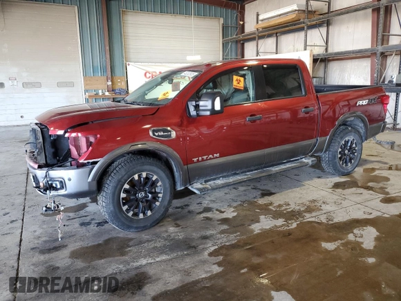 2017 Nissan Titan Platinum Reserve with VIN 1N6AA1E52HN501110, listed as a Copart auction lot 48202935 with 83,674 mi miles and Salvage title. Bid and sale history available at DreamBid. Image 1.