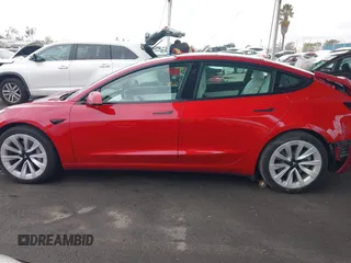 2021 Tesla Model 3 Long Range with VIN 5YJ3E1EB3MF862392, listed as a IAAI auction lot 41765987 with 51,915 mi miles and . Bid and sale history available at DreamBid. Image 13.