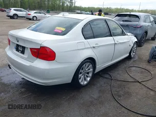 2011 BMW 3 Series 328i xDrive with VIN WBAPK7C58BA820717, listed as a IAAI auction lot 42080003 with 213,034 mi miles. Bid and sale history available at carsss.com. Image 4.