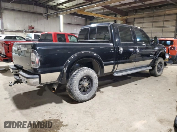 2001 Ford F-350 with VIN 1A040185, listed as a Copart auction lot 87953295 with 212,487 mi miles and Salvage title. Bid and sale history available at DreamBid. Image 3.
