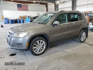 2011 Volkswagen Tiguan SEL z VIN WVGBV7AXXBW559663, wystawiony jako Copart lot #52307905 z przebiegiem 125 263 mil mil oraz Szkoda całkowita • Salvage title. Historia ofert i sprzedaży dostępna na DreamBid. Obrazek 1.