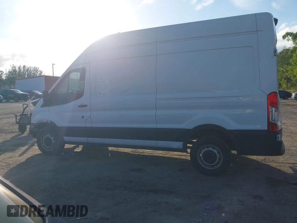 2021 Ford Transit Cargo with VIN 1FTBR1X87MKA50288, listed as a IAAI auction lot 41432535 with 96,934 mi miles and . Bid and sale history available at DreamBid. Image 14.