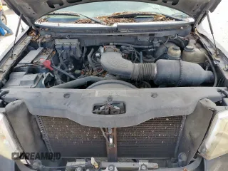 2005 Ford F-150 XLT с VIN 1FTRW12W45KC60877, выставлен на аукционе Copart как лот 58039515 с пробегом Не указан миль и Списание • Salvage title. История ставок и продаж доступна на DreamBid. Изображение 11.