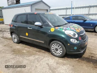 2015 FIAT 500L Lounge with VIN ZFBCFACH2FZ034998, listed as a Copart auction lot 54058445 with 149,247 mi miles and Salvage title. Bid and sale history available at DreamBid. Image 4.