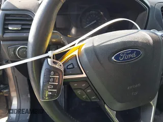 2018 Ford Fusion SE z VIN 3FA6P0LU8JR116073, wystawiony jako IAAI lot #41773037 z przebiegiem 100 864 mil mil oraz . Historia ofert i sprzedaży dostępna na DreamBid. Obrazek 11.