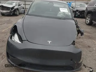 2023 Tesla Model Y Long Range with VIN 7SAYGAEE8PF587202, listed as a IAAI auction lot 41306811 with 1 mi miles. Bid and sale history available at carsss.com. Image 11.
