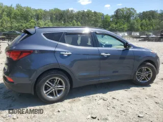2017 Hyundai Santa Fe 2.4L z VIN 5NMZUDLB7HH028678, wystawiony jako Copart lot #57557855 z przebiegiem 102 049 mil mil oraz Szkoda całkowita • Salvage title. Historia ofert i sprzedaży dostępna na DreamBid. Obrazek 3.