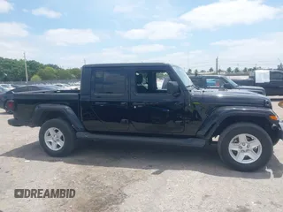 2022 Jeep Gladiator Willys Sport z VIN 1C6HJTAG7NL161701, wystawiony jako IAAI lot #42097144 z przebiegiem 32 989 mil mil oraz . Historia ofert i sprzedaży dostępna na DreamBid. Obrazek 14.
