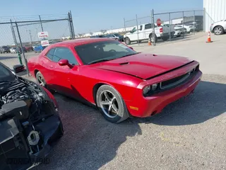 2012 Dodge Challenger SXT with VIN 2C3CDYAG9CH291291, listed as a IAAI auction lot 41787999 with 139,441 mi miles. Bid and sale history available at carsss.com. Image 1.