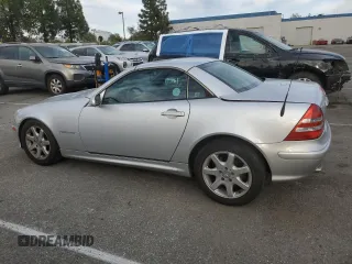 2001 Mercedes-Benz SLK 230 Kompressor with VIN WDBKK49F21F193606, listed as a Copart auction lot 47139945 with 156,424 mi miles and Salvage title. Bid and sale history available at DreamBid. Image 2.
