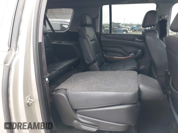 2017 Chevrolet Suburban Premier with VIN 1GNSCJKC4HR183592, listed as a IAAI auction lot 41514348 with 144,460 mi miles and . Bid and sale history available at DreamBid. Image 8.