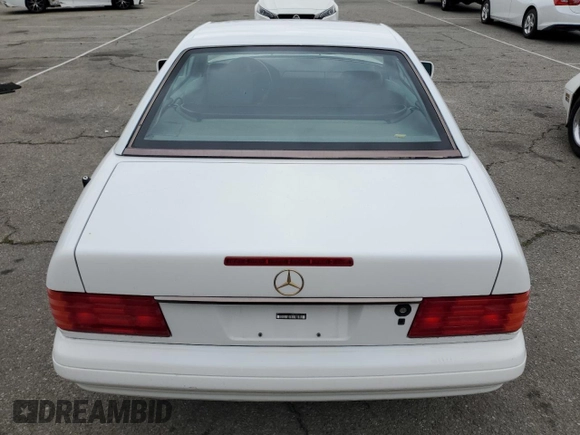 1997 Mercedes-Benz SL 500 with VIN WDBFA63F5VF143197, listed as a Copart auction lot 45003735 with 100,252 mi miles and Salvage title. Bid and sale history available at DreamBid. Image 6.