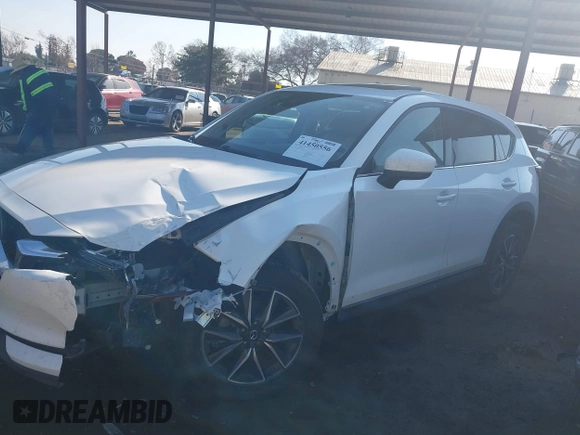 2017 Mazda CX-5 Grand Touring with VIN JM3KFBDL6H0164993, listed as a IAAI auction lot 41450556 with 97,733 mi miles. Bid and sale history available at carsss.com. Image 14.