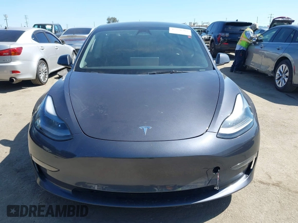 2023 Tesla Model 3 with VIN 5YJ3E1EA7PF673322, listed as a IAAI auction lot 42226767 with 18,367 mi miles and . Bid and sale history available at DreamBid. Image 11.