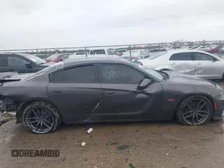2020 Dodge Charger Scat Pack z VIN 2C3CDXGJXLH107344, wystawiony jako IAAI lot #41888453 z przebiegiem Nie podano mil oraz . Historia ofert i sprzedaży dostępna na DreamBid. Obrazek 14.