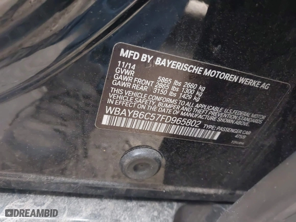2015 BMW 7 Series 750i xDrive with VIN WBAYB6C57FD965802, listed as a IAAI auction lot 40588698 with 999,999 mi miles. Bid and sale history available at carsss.com. Image 9.