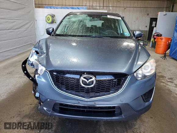 2015 Mazda CX-5 Sport with VIN JM3KE4BY9F0552942, listed as a Copart auction lot 54750245 with 129,700 mi miles and Salvage title. Bid and sale history available at DreamBid. Image 5.