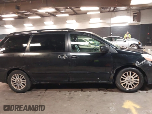 2009 Toyota Sienna XLE with VIN 5TDZK22C19S232024, listed as a IAAI auction lot 42081485 with 179,257 mi miles. Bid and sale history available at carsss.com. Image 13.