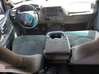 2001 Ford F-150 XLT с VIN 1FTRW07L01KF03457, выставлен на аукционе Copart как лот 60086725 с пробегом 205 917 миль миль и Списание • Salvage title. История ставок и продаж доступна на DreamBid. Изображение 8.
