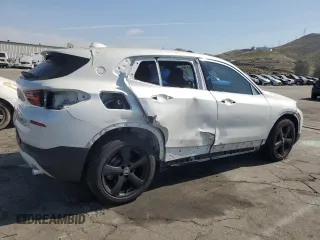 2018 BMW X2 sDrive28i with VIN WBXYJ3C34JEJ84163, listed as a Copart auction lot 54043904 with 46,509 mi miles and Salvage title. Bid and sale history available at DreamBid. Image 3.