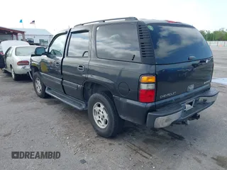 2005 Chevrolet Tahoe LS with VIN 1GNEC13V35R263104, listed as a IAAI auction lot 41918482 with 208,520 mi miles and . Bid and sale history available at DreamBid. Image 3.