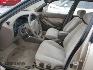 1995 Toyota Camry LE with VIN 4T1SK12E8SU548790, listed as a Copart auction lot 59390925 with 207,392 mi miles and Salvage title. Bid and sale history available at DreamBid. Image 7.