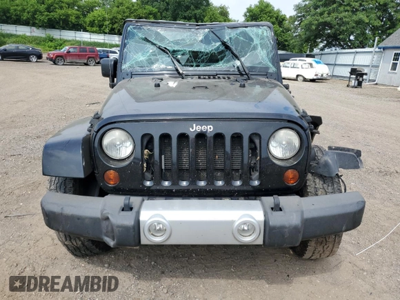 2013 Jeep Wrangler Unlimited Sahara with VIN 1C4BJWEG8DL678692, listed as a Copart auction lot 62289785 with 132,528 mi miles and Clean title. Bid and sale history available at DreamBid. Image 5.