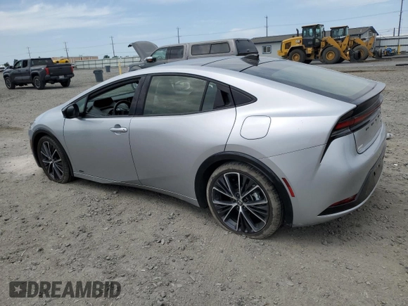 2024 Toyota Prius LE with VIN JTDADABU4R3011917, listed as a Copart auction lot 61184665 with 6,612 mi miles and Salvage title. Bid and sale history available at DreamBid. Image 2.