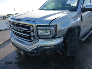 2017 GMC Sierra 1500 SLT z VIN 1GTV2NEC6HZ102412, wystawiony jako IAAI lot #41170633 z przebiegiem 163 321 mil mil oraz . Historia ofert i sprzedaży dostępna na DreamBid. Obrazek 6.
