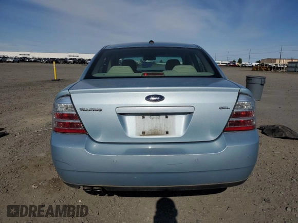 2008 Ford Taurus SEL z VIN 1FAHP24W38G148905, wystawiony jako Copart lot #59186355 z przebiegiem 108 185 mil mil oraz Szkoda całkowita • Salvage title. Historia ofert i sprzedaży dostępna na DreamBid. Obrazek 6.