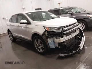 2015 Ford Edge Titanium z VIN 2FMTK4K89FBB03504, wystawiony jako IAAI lot #42125297 z przebiegiem 129 976 mil mil oraz . Historia ofert i sprzedaży dostępna na DreamBid. Obrazek 1.