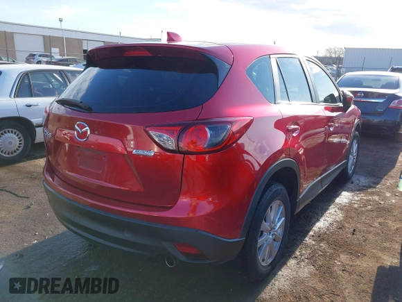 2015 Mazda CX-5 Sport z VIN JM3KE2BE7F0516869, wystawiony jako IAAI lot #41866488 z przebiegiem 131 237 mil mil oraz . Historia ofert i sprzedaży dostępna na DreamBid. Obrazek 4.
