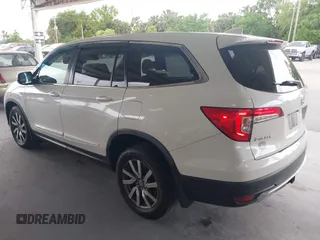 2019 Honda Pilot EX-L with VIN 5FNYF6H57KB011649, listed as a IAAI auction lot 41880951 with 99,504 mi miles. Bid and sale history available at carsss.com. Image 3.