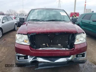 2005 Ford F-150 XLT with VIN 1FTPX12595FA43412, listed as a IAAI auction lot 41902118 with 198,025 mi miles. Bid and sale history available at carsss.com. Image 12.