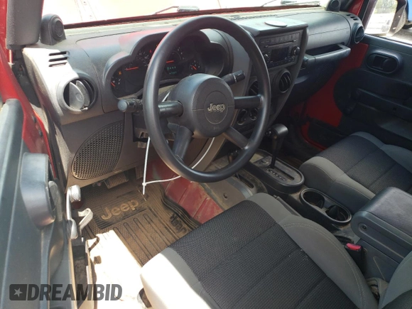 2007 Jeep Wrangler X with VIN 1J4FA24197L185416, listed as a Copart auction lot 59943735 with 147,984 mi miles and Salvage title. Bid and sale history available at DreamBid. Image 8.