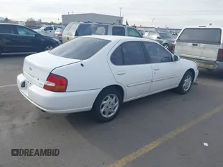 1999 Nissan Altima XE with VIN 1N4DL01DXXC189667, listed as a IAAI auction lot 41715276 with 132,425 mi miles. Bid and sale history available at carsss.com. Image 4.