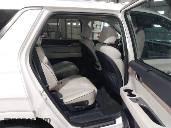 2021 Hyundai Palisade Limited z VIN KM8R5DHEXMU210597, wystawiony jako IAAI lot #41869656 z przebiegiem 56 874 mil mil oraz . Historia ofert i sprzedaży dostępna na DreamBid. Obrazek 8.