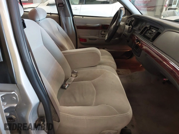 2000 Mercury Grand Marquis LS z VIN 2MEFM75W0YX736324, wystawiony jako IAAI lot #41865927 z przebiegiem 136 886 mil mil oraz . Historia ofert i sprzedaży dostępna na DreamBid. Obrazek 5.