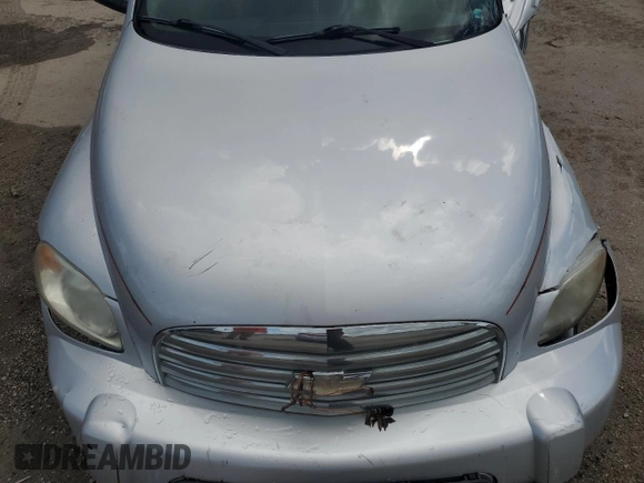 2011 Chevrolet HHR LS z VIN 3GNBAAFW7BS560592, wystawiony jako Copart lot #70435424 z przebiegiem Nie podano mil oraz Szkoda całkowita • Salvage title. Historia ofert i sprzedaży dostępna na DreamBid. Obrazek 13.